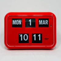 Retro red analog flip clock with perpetual calendar, vintage mechanical flip display, mid-century modern desk or wall clock
